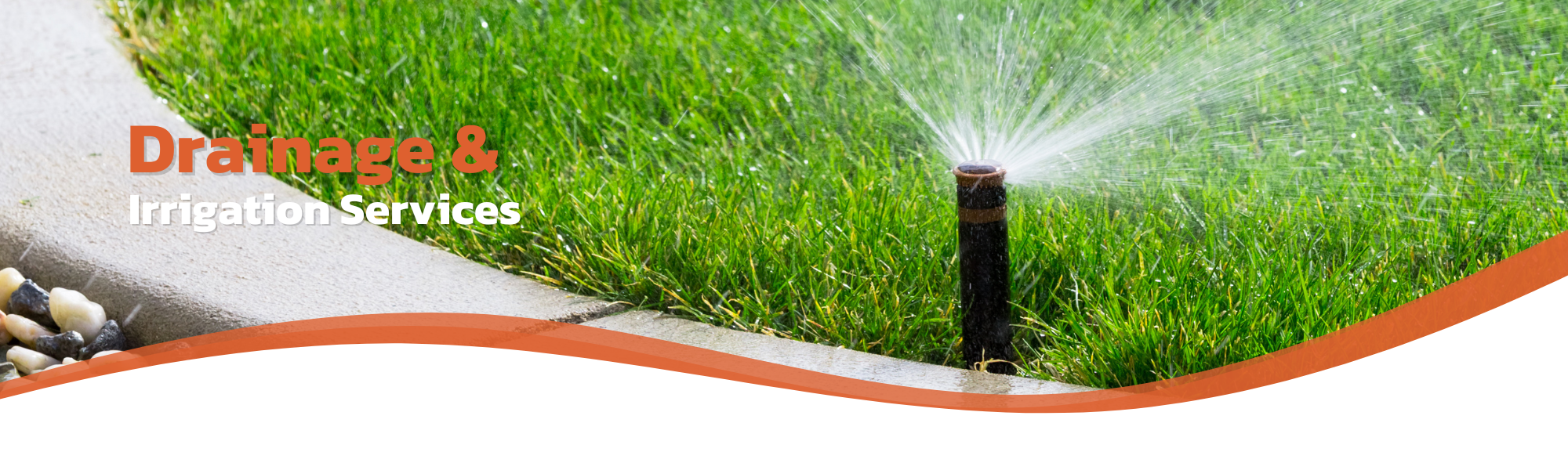 sprinkler system watering lawn